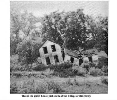 Black and white "ghost house" south of village of Ridgeway