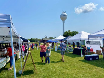 Fair with water tower in background